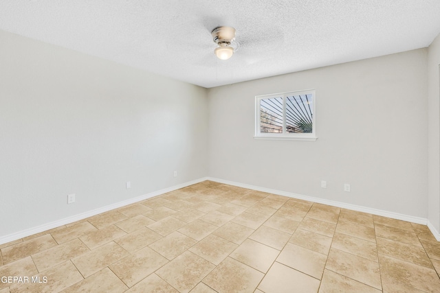 729 Delhi Dr, Socorro, TX 79927 - unfurnished room featuring a ceiling fan, a textured ceiling, and baseboards