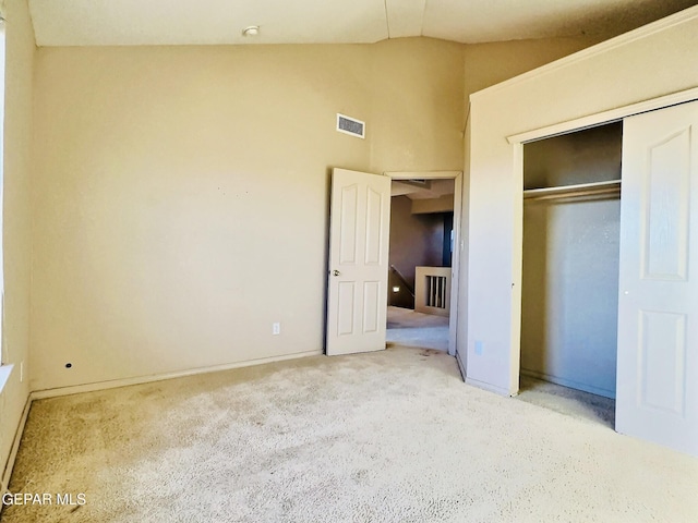 549 Northwyck Way, El Paso, TX 79928 - unfurnished bedroom with vaulted ceiling, carpet, a closet, and baseboards