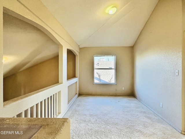 549 Northwyck Way, El Paso, TX 79928 - spare room featuring carpet and lofted ceiling