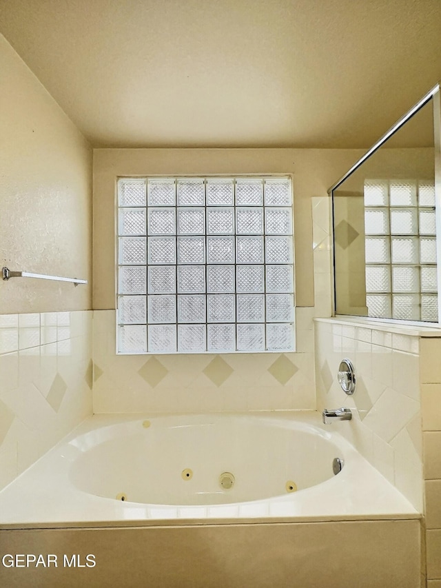 549 Northwyck Way, El Paso, TX 79928 - bathroom featuring a jetted tub and a shower