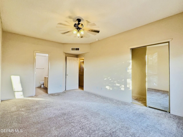 549 Northwyck Way, El Paso, TX 79928 - unfurnished bedroom with carpet flooring, ensuite bath, a ceiling fan, and baseboards
