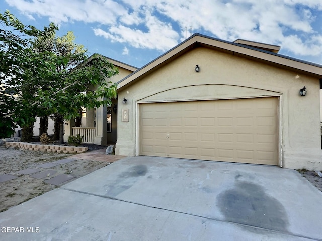 549 Northwyck Way, El Paso, TX 79928 - view of front of house with stucco siding, an attached garage, and concrete driveway