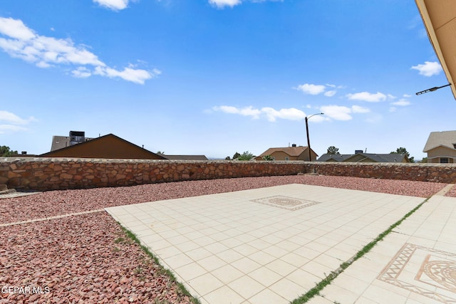 1461 Luz De Luna Pl, El Paso, TX 79912 - fenced backyard with a patio