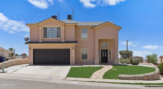 1461 Luz De Luna Pl, El Paso, TX 79912 - view of front of house with stucco siding, a garage, and driveway