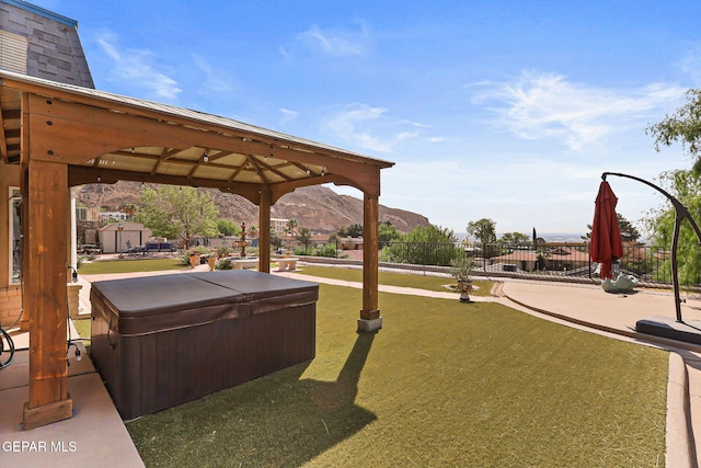 1428 Camino Alto Rd, El Paso, TX 79902 - view of yard with a hot tub, a gazebo, and a mountain view