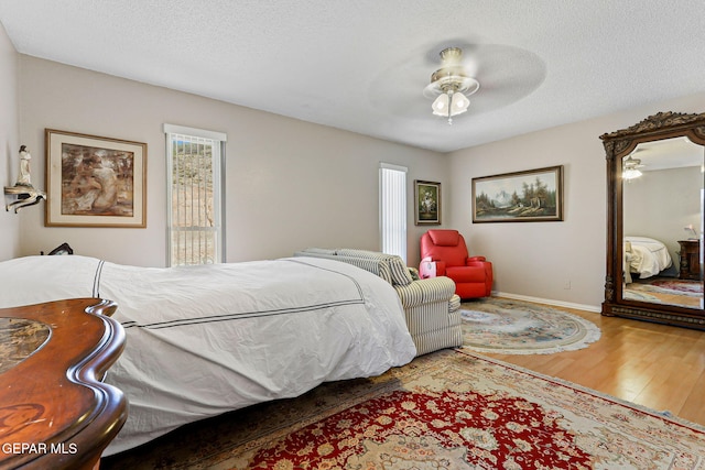 1428 Camino Alto Rd, El Paso, TX 79902 - bedroom featuring wood finished floors and baseboards