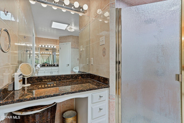 1428 Camino Alto Rd, El Paso, TX 79902 - bathroom with a stall shower and vanity