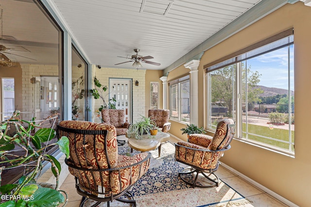 1428 Camino Alto Rd, El Paso, TX 79902 - sunroom featuring baseboards and tile patterned floors