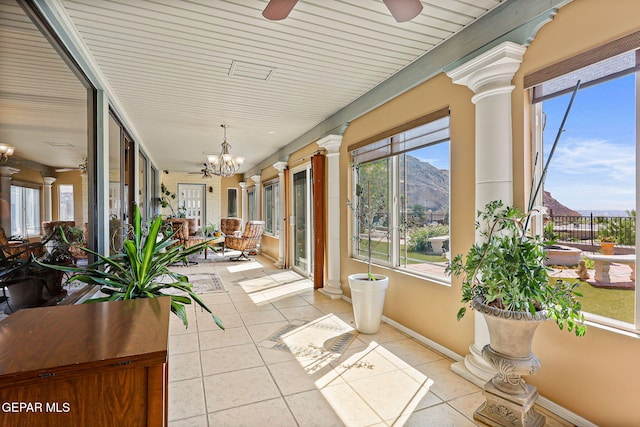 1428 Camino Alto Rd, El Paso, TX 79902 - sunroom with decorative columns, a mountain view, and plenty of natural light