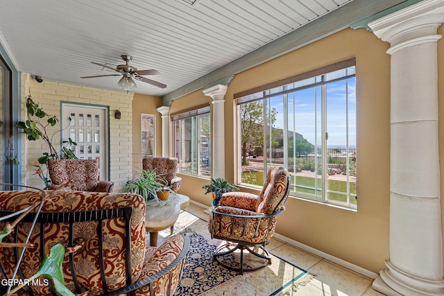 1428 Camino Alto Rd, El Paso, TX 79902 - sunroom / solarium with decorative columns, healthy amount of natural light, baseboards, and brick wall