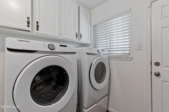 1428 Camino Alto Rd, El Paso, TX 79902 - washroom featuring independent washer and dryer and cabinet space
