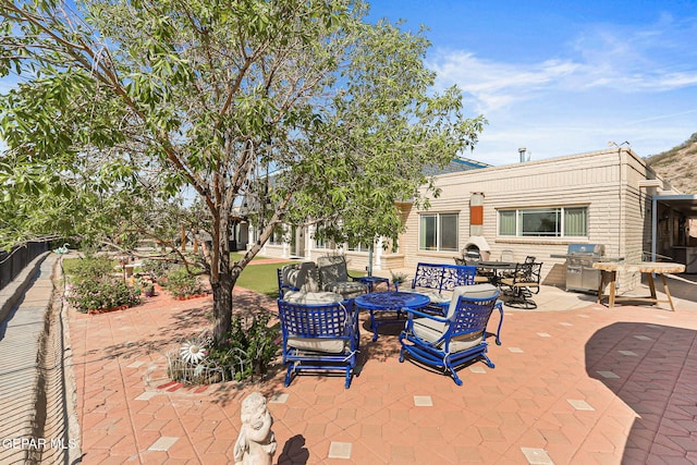 1428 Camino Alto Rd, El Paso, TX 79902 - view of patio with area for grilling and outdoor dining area