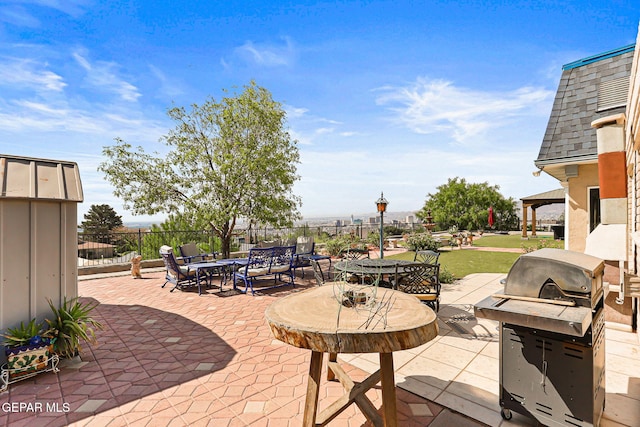1428 Camino Alto Rd, El Paso, TX 79902 - view of patio featuring outdoor dining space, grilling area, and a gazebo