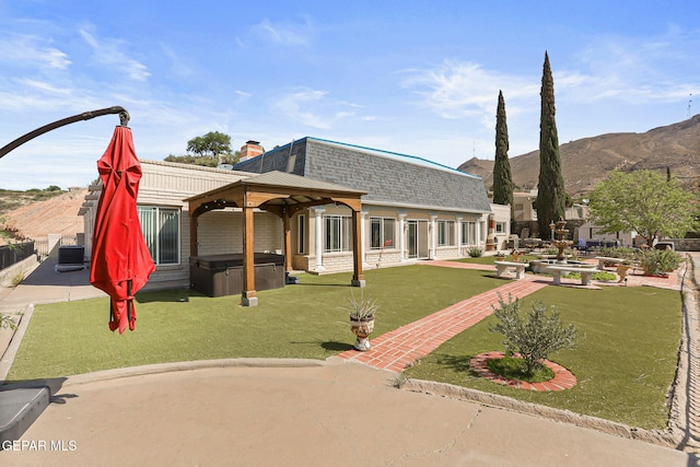 1428 Camino Alto Rd, El Paso, TX 79902 - view of property's community featuring a jacuzzi, a patio, a gazebo, a yard, and a mountain view