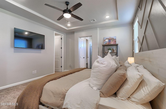 289 Hunstanton St, Horizon City, TX 79928 - bedroom featuring a tray ceiling, baseboards, carpet flooring, recessed lighting, and ceiling fan