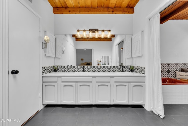 724 Gary Ln, El Paso, TX 79922 - full bathroom with wood ceiling with exposed beams, tile patterned floors, and double vanity