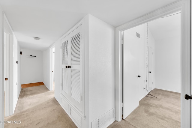 724 Gary Ln, El Paso, TX 79922 - corridor featuring light carpet and baseboards
