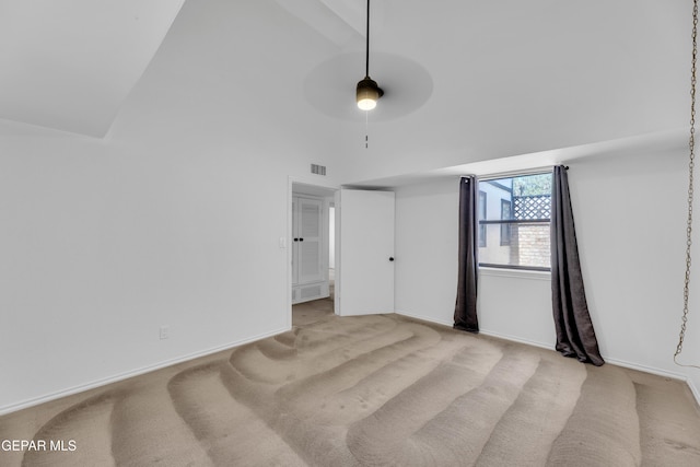 724 Gary Ln, El Paso, TX 79922 - spare room with high vaulted ceiling, light colored carpet, a ceiling fan, and baseboards