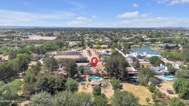 724 Gary Ln, El Paso, TX 79922 - drone / aerial view of a nearby body of water, a pool, and a tree filled landscape
