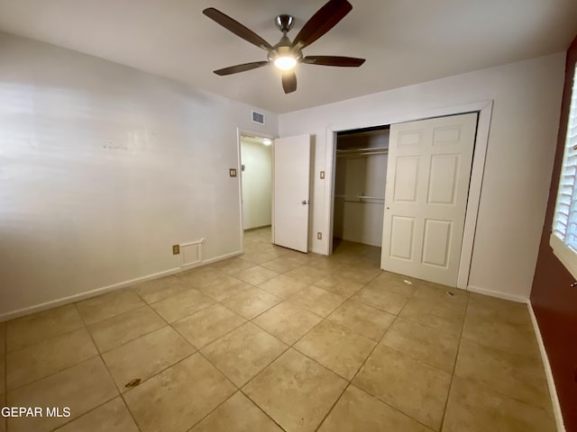 350 Thunderbird Dr Unit F45, El Paso, TX 79912 - unfurnished bedroom featuring light tile patterned floors, a closet, a ceiling fan, and baseboards