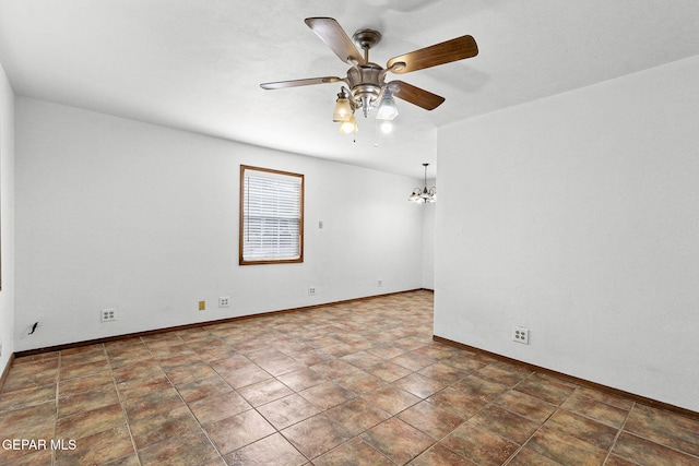 5609 Paradise Ln, El Paso, TX 79924 - spare room featuring a ceiling fan and baseboards