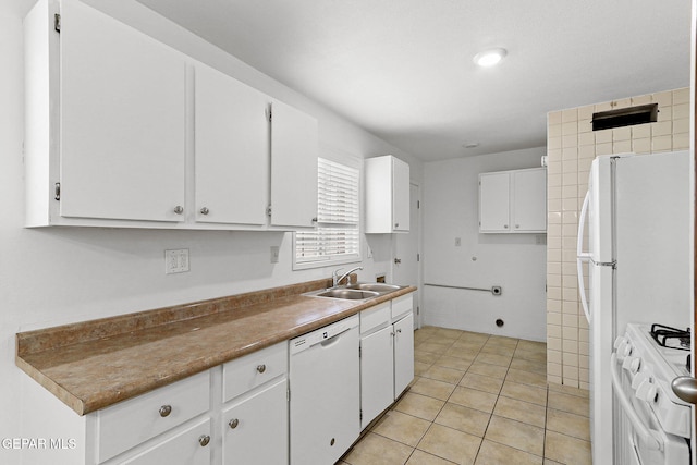 5609 Paradise Ln, El Paso, TX 79924 - kitchen with white appliances, a sink, white cabinetry, and light tile patterned flooring