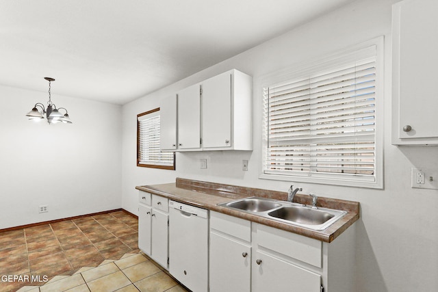 5609 Paradise Ln, El Paso, TX 79924 - kitchen featuring white dishwasher, a sink, white cabinetry, a chandelier, and decorative light fixtures