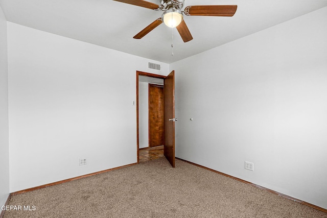5609 Paradise Ln, El Paso, TX 79924 - spare room with carpet, baseboards, and a ceiling fan