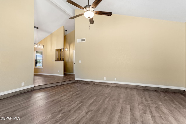 5261 Roger Maris Dr, El Paso, TX 79934 - spare room with ceiling fan, high vaulted ceiling, dark wood finished floors, beam ceiling, and baseboards