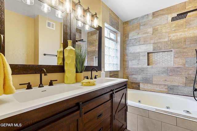 5261 Roger Maris Dr, El Paso, TX 79934 - full bathroom featuring a jetted tub and double vanity