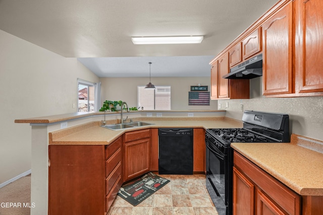 7009 Falling Leaf Cir, El Paso, TX 79934 - kitchen with black appliances, a sink, under cabinet range hood, a peninsula, and light countertops