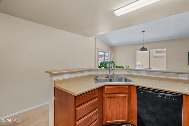 7009 Falling Leaf Cir, El Paso, TX 79934 - kitchen featuring black dishwasher, a sink, carpet, light countertops, and hanging light fixtures