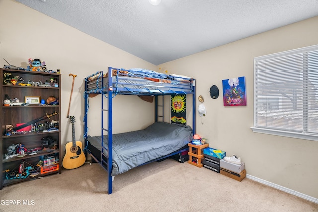 7009 Falling Leaf Cir, El Paso, TX 79934 - carpeted bedroom featuring baseboards and a textured ceiling