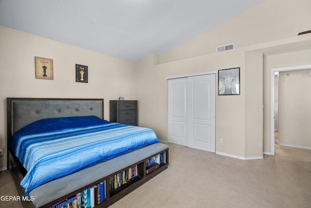 7009 Falling Leaf Cir, El Paso, TX 79934 - carpeted bedroom with vaulted ceiling, a closet, and baseboards
