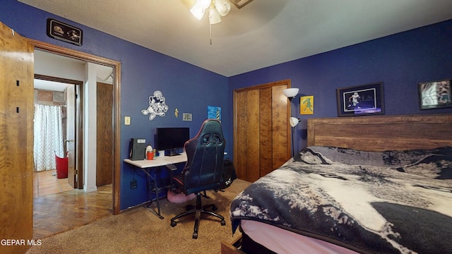 492 Country Oaks Dr, El Paso, TX 79932 - carpeted bedroom featuring a closet, a ceiling fan, and an office area
