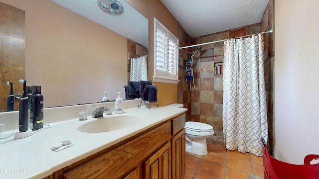 492 Country Oaks Dr, El Paso, TX 79932 - bathroom featuring vanity, toilet, and a tile shower