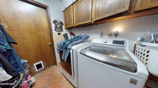 492 Country Oaks Dr, El Paso, TX 79932 - laundry area with cabinet space, separate washer and dryer, and light tile patterned flooring