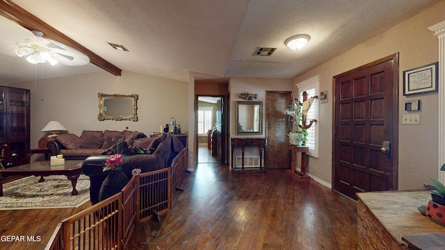 492 Country Oaks Dr, El Paso, TX 79932 - living room with ceiling fan, plenty of natural light, a textured ceiling, wood finished floors, and baseboards