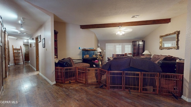 492 Country Oaks Dr, El Paso, TX 79932 - living area featuring wood finished floors, beam ceiling, and baseboards