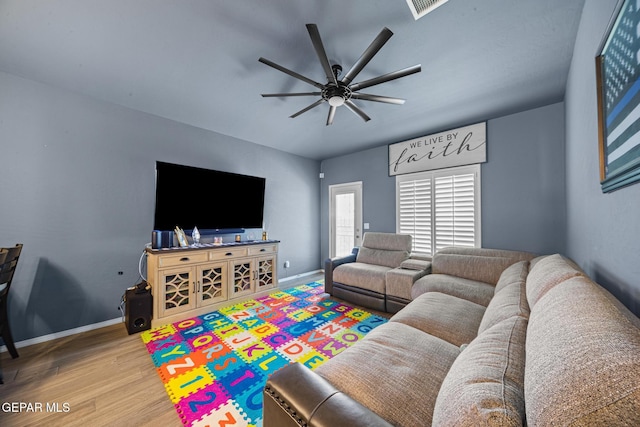 12805 Epsom Dr, Horizon City, TX 79928 - living area featuring wood finished floors, ceiling fan, and baseboards