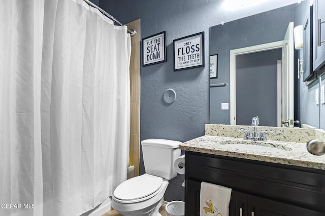 12805 Epsom Dr, Horizon City, TX 79928 - full bath with a textured wall, vanity, toilet, and shower / bath combination with curtain