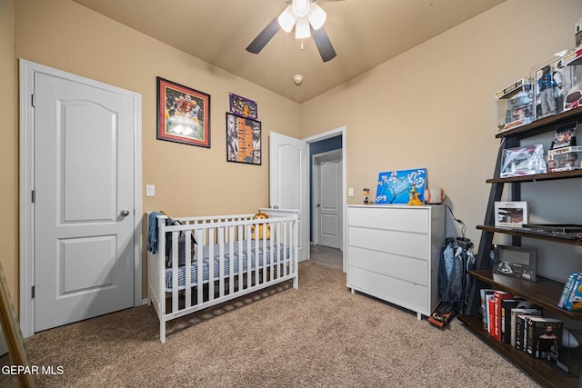 12805 Epsom Dr, Horizon City, TX 79928 - bedroom featuring carpet, a nursery area, and a ceiling fan