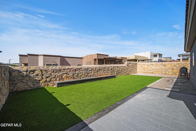 12805 Epsom Dr, Horizon City, TX 79928 - view of grassy yard featuring a patio area