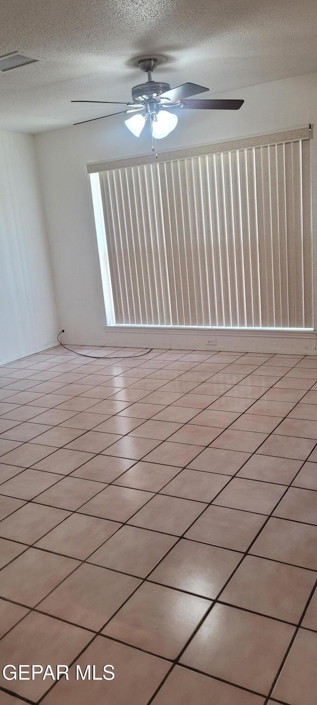5121 Orleans Ave, El Paso, TX 79924 - empty room with a ceiling fan and a textured ceiling