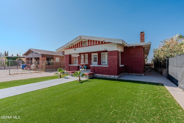 2712 Federal Ave, El Paso, TX 79930 - view of front of house with a chimney and brick siding