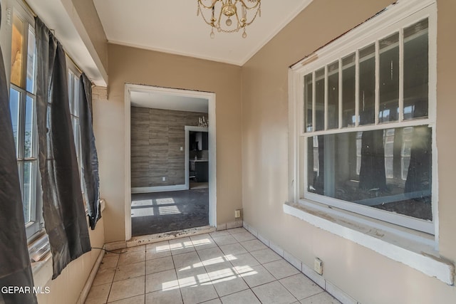 2712 Federal Ave, El Paso, TX 79930 - unfurnished sunroom featuring a chandelier