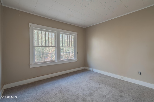 2712 Federal Ave, El Paso, TX 79930 - carpeted empty room with crown molding and baseboards
