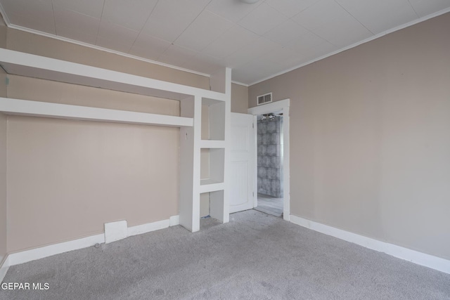 2712 Federal Ave, El Paso, TX 79930 - unfurnished bedroom with crown molding, carpet, and baseboards