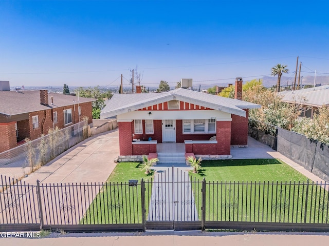 2712 Federal Ave, El Paso, TX 79930 - bungalow-style home with brick siding, a chimney, concrete driveway, and central AC