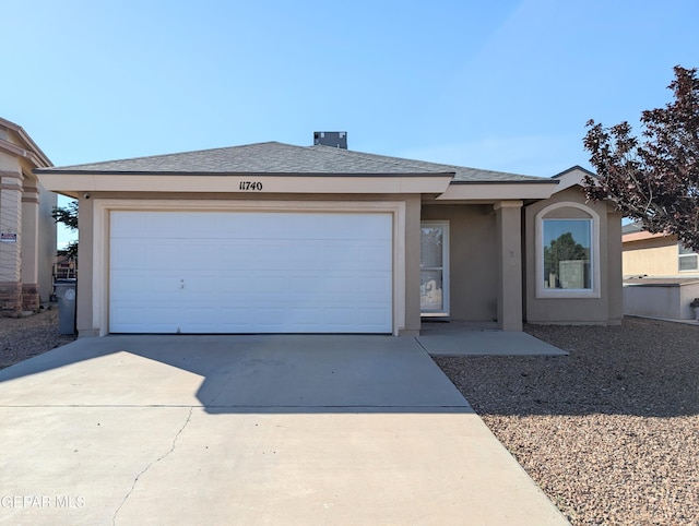 11740 Autumn Wheat Dr, El Paso, TX 79934 - single story home with driveway, an attached garage, and stucco siding